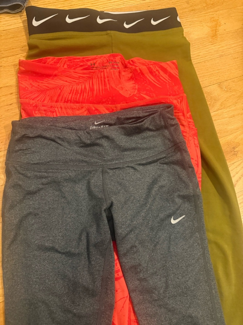 Nike and under armor women’s 3-Pack Leggings in Olive, Red, and Charcoal